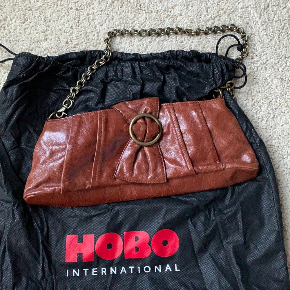 Hobo leather clutch with metal chain strap